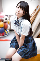 Student Minano Ai seated in gym