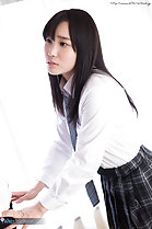 Long hair falling over her uniform shirt