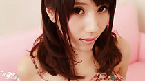 Pretty Maiko long hair down over her shoulders wearing summer dress