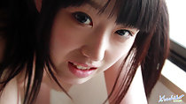 Machiko smiling face framed by long hair