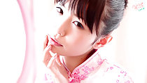 Hand raised to chin in cheongsam