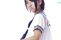 Kogal Nozomi sucking lollipop while stripping her uniform
