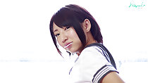 Looking back cheek bulging with lollipop