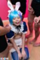 Misa on her knees cocks stroked around her