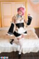 Aya komatsu standing beside bed
