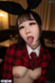 Tongue extended bare breasts
