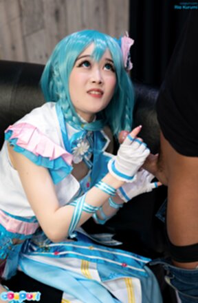 Ria Kurumi sitting at dinner table giving handjob