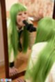 Mizuki sucking dildo on all fours in front of mirror