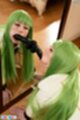 Mizuki sucking black dildo looking in mirror