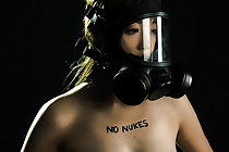 Small titted Ayaka Minamino nude in gas mask