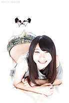 Tojo Aki lying on her front