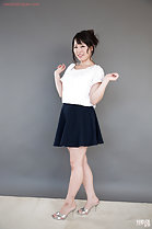 Wearing black skirt in high heels