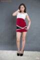 Wearing short dress in high heels