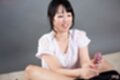 Looking at hard cock on her knees stroking cock