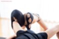 On all fours long hair framing her face