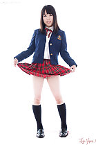 Yuka Shirayuki lifting hem of plaid skirt wearing socks