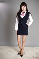 Office lady with hand on hip wearing high heels