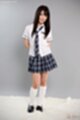 Student in uniform hands behind her back.jpeg