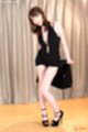 Kisaki aya raising dress over her thighs knees pressed together high heels