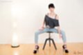Matsuda anna seated on stool legs spread wide wearing jeans black high heels