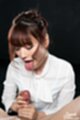 Mizuki looking down tongue out hands around erect cock
