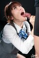 Looking up stroking cock holding cock to her tongue
