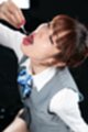 Mizuki kneeling mouth open playing with cum