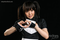 Cutie sakura sena making hearts wearing maid uniform hair in pigtails.jpg