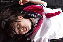 Kogal Araki Mai lying exhausted in uniform her face covered in cum