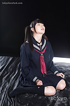 Kneeling in uniform eyes closed