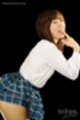 Leaning forward wearing uniform