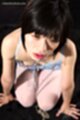 Otohata yuzuki kneeling in lingerie white stockings wearing bondage chain
