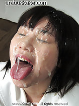 Eyes closed tongue extended thick cum covering her face