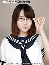 Kogal in uniform adjusting her glasses